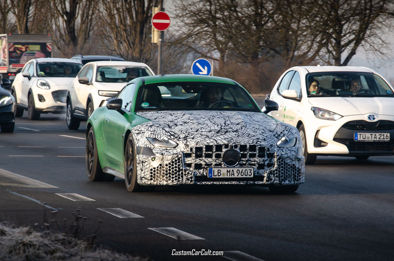 Front shot of a camouflaged Mercedes-AMG GT 63 Coupe prototype